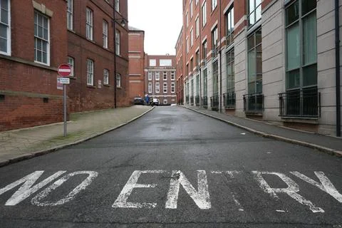 No Entry Street With Brick And Modern Buildings In Nottingham, England. Stock Photos