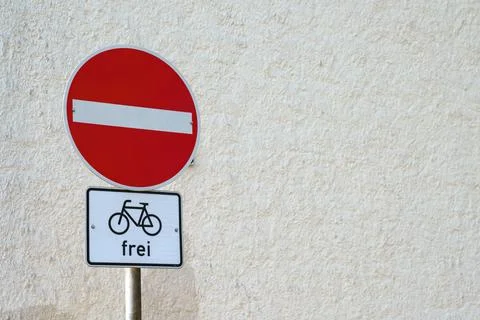 No entry traffic sign on the background of a white wall. Sign with a bicycle Stock Photos