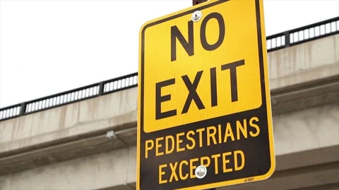 No exit pedestrians excepted yellow black vertical rectangle sign on post Stock-Footage 247753873