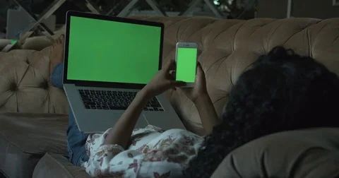 No Face Afro American Using Mobile Green Screen Playing Chatting Texting Stock Footage 84073506