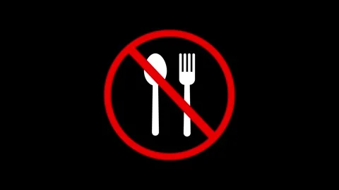 No food allowed fork spoon crossed sign of red color no eat meals Stock Footage 310659385