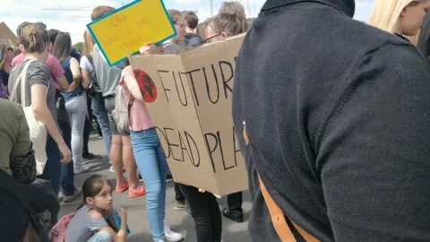 NO FUTURE ON A DEAD PLANET placard at protest for climate justice Vienna 4K Stock Footage 133658084