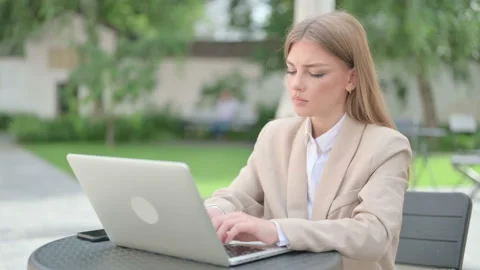 No Gesture with Head shake by Young Businesswoman in Outdoor Cafe Video stock 156972223