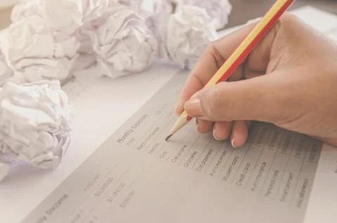 No idea and fail concept - Human hand holding crumpled paper and trash. Stock Photos