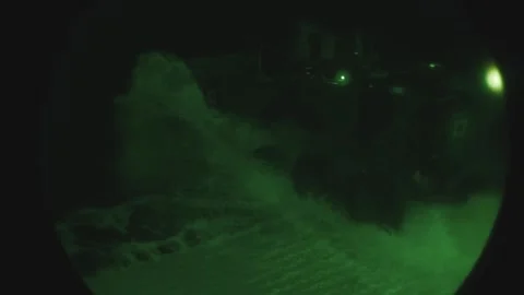 No-light imagery Amphibious Combat Vehicle entering sea from well deck of ship Stock Footage 291103099