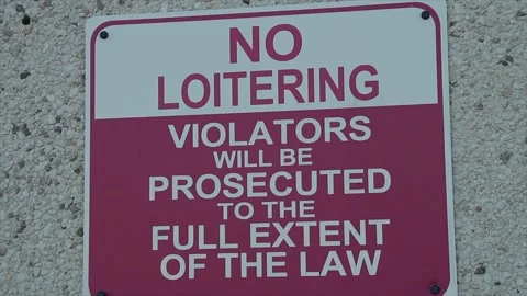 No loitering violators will be prosecuted to the full extent of the law writing Stock Footage 249100311