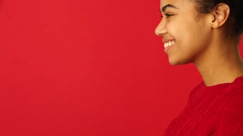 No mask needed. Side view of cheerful mixed race girl taking off protective face Stock Footage 146129081