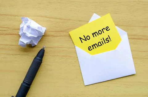 No more emails text on yellow paper in an envelope. Resignation concept No... Stock-Fotos
