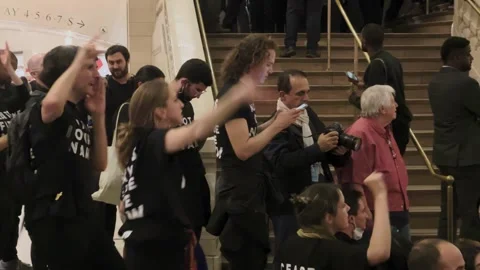 No more weapons no more war ceasefire in Palestine protest in Grand Central  Stock Footage 254347296
