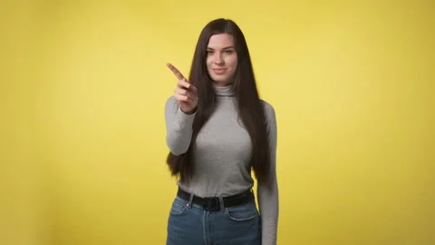 No, no, do not do it. Pretty brunette woman in black turtleneck or sweater shows Stock Footage 159255609
