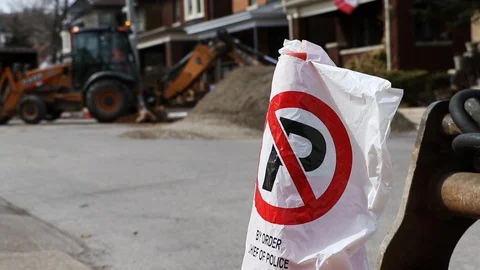 No Parking pilon with construction digge... | Stock Video | Pond5