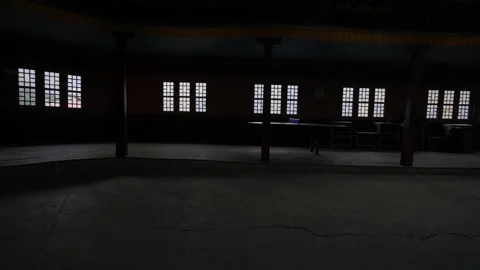 No people inside dark hall with five windows. Real buddhist monastery interior Stock Footage 167532667