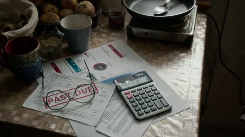 No People Shot of Kitchen Table Cluttered with Past-Due Bills Stock Footage 314624660