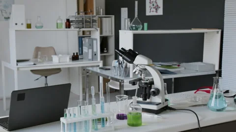 No People Shot of Microscope and Colorful Lab Equipment in Scientific Laboratory Video stock 312320634