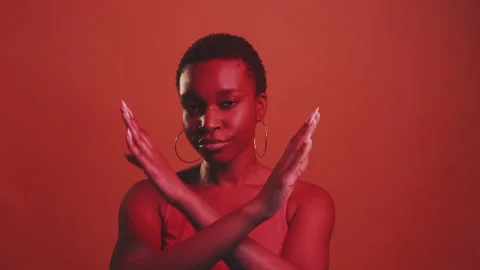 No racism protest x gesture red woman gif loop Stock Footage 232720530