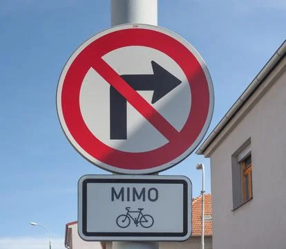 No right turn except bikes sign Stock Photos
