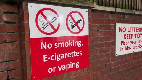 No Smoking, E-Cigarettes, or Vaping Sign at a UK Transport Terminus Stock Footage 251677463