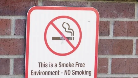 No smoking sign on brick wall in smoke free environment Stock Footage 340183873