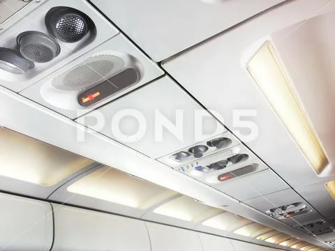 No smoking signs and controls for adjusting the air conditioning and personal Stock Photos