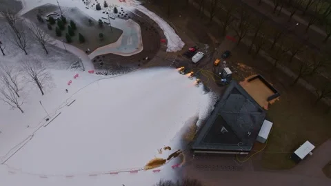 No-Snow Winter Resort Scene – Artificial Snow Used to Build Ski Slope in Latvia Video stock 323048360