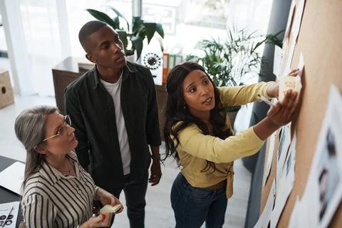 No steering on waves of hostile panic, be teachable. a group of businesspeople Stock Photos