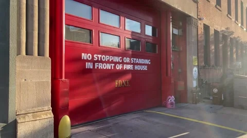 No Stopping or Standing in Front of Fire House FDNY Garage Door in Park Slo.. Stock Footage 228690281