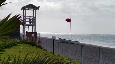 No Swimming Red Flag. Rough Storm Sea Red Flag Anchor Bbackground.  Stock Footage 221644992