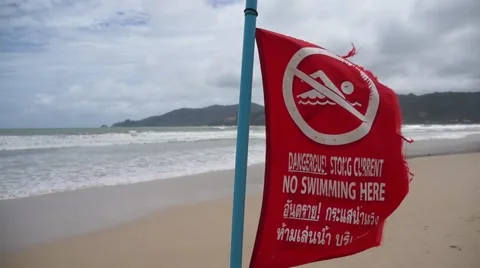 No swimming, red warning flag, hand camera Stock Footage 43259470