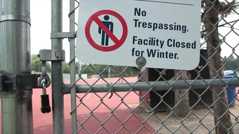 No trespassing facility closed for winter sign with illustration of crossed out Stock Footage 247748890