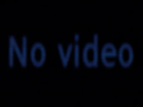 No Video system message accompanied by strobing on black TV screen Stock Footage 71378598