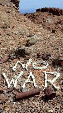 No War bones message in abandoned wasteland with rusted metal Stock Photos