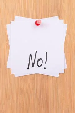 NO - White Sticky Notes with Written Word NO, Pinned to the Wooden Message Board Stock Photos