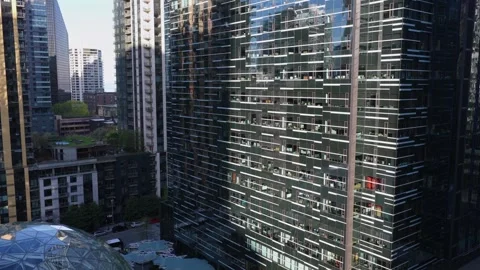Noble glass windows of modern skyscraper at Amazon Corporate Headquarters in Stock Footage 335894848