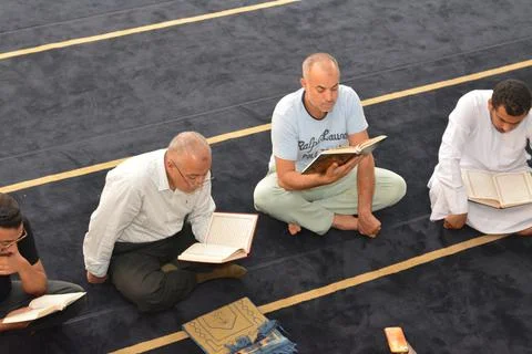 A Noble Quran reading ring inside a mosque at the day of Arafah Stock Photos
