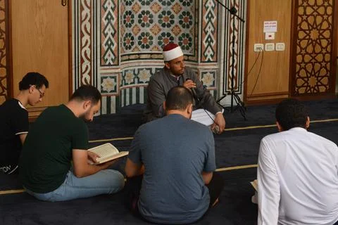 A Noble Quran reading ring inside a mosque at the day of Arafah Stock Photos