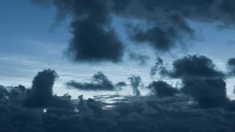 Noctilucent clouds NLC with filament gravity wave structure behind low Stock Footage 77916314