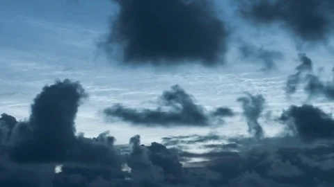Noctilucent clouds NLC with filament gravity wave structure behind low Stock Footage 77918037