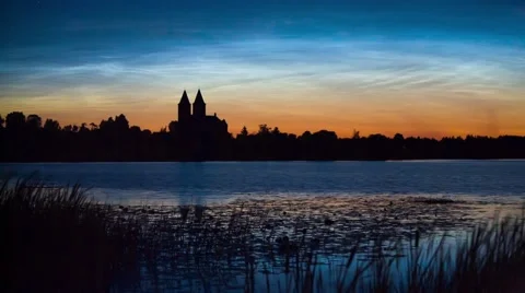Noctilucent clouds over the lake Video stock 61335794
