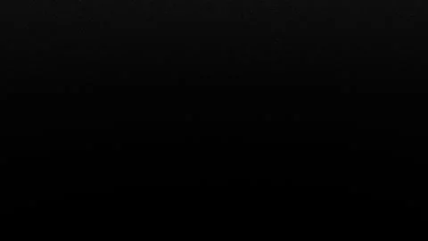 Noctilucent particles falling on a dark background. Abstract, animated, festive Stock Footage 276987028