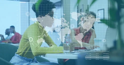 Node lighting up initiating business map data animation while coworkers noting Stock-Footage 312083214