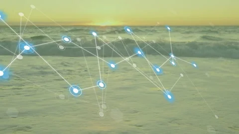 Node network entering from left, layering over sunset surf and linking pulsing Stock Footage 334369199
