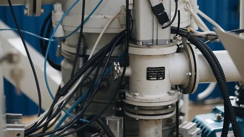 The node setup in an industrial plant. Close-up of the machine. Pipes and wires. Video stock 114536179