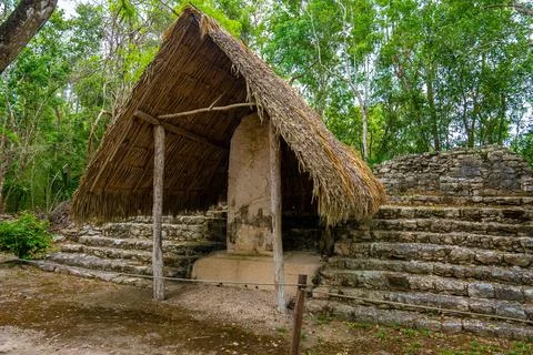 Nohoch Mul Pyramid and stele at the ancient ruins of the Mayan city Coba Stock Photos