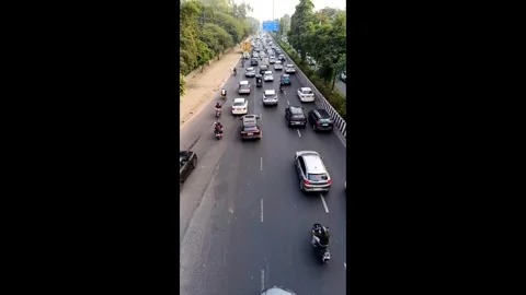 Noida , India - Traffic on highway with selective focus dec 21 2024 Stock Footage 296145593