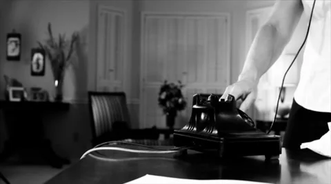 Noir man walking out while woman dials phone Stock Footage