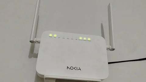 Nokia WiFi Router Mounted on Wall with Active Internet Connection and Stable  Video stock 332625817