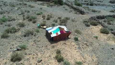 Nomadic Desert Tent in Rocky Moroccan Landscape Aerial Drone View Stock Footage 335719927