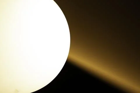 Non AI generated, Close up bright spherical interior pendant lamp light Stock Photos