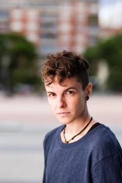 Non binary hispanic transgender mid Tomboy. Androgynous authentic identity for Stock Photos