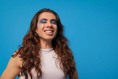 Non-binary stylish person smiling very happy Stock Photos